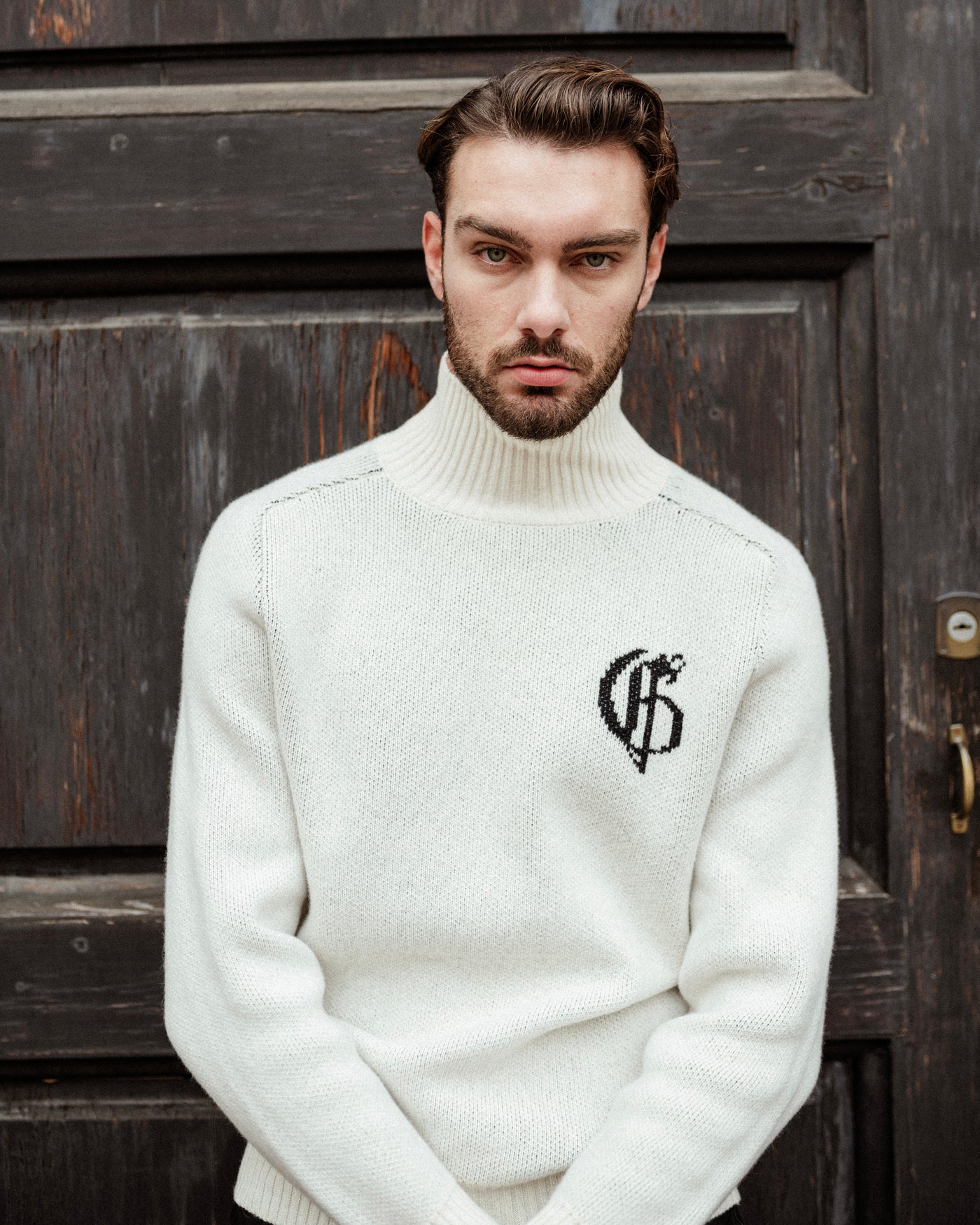 White knitted turtleneck sweater with logo