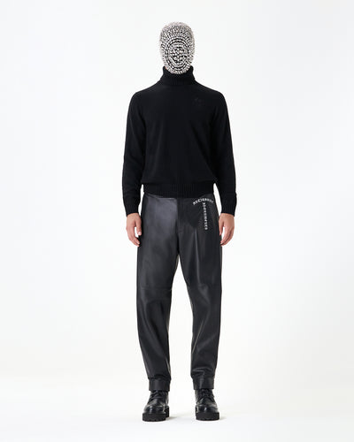 Black calfskin pants with lapels