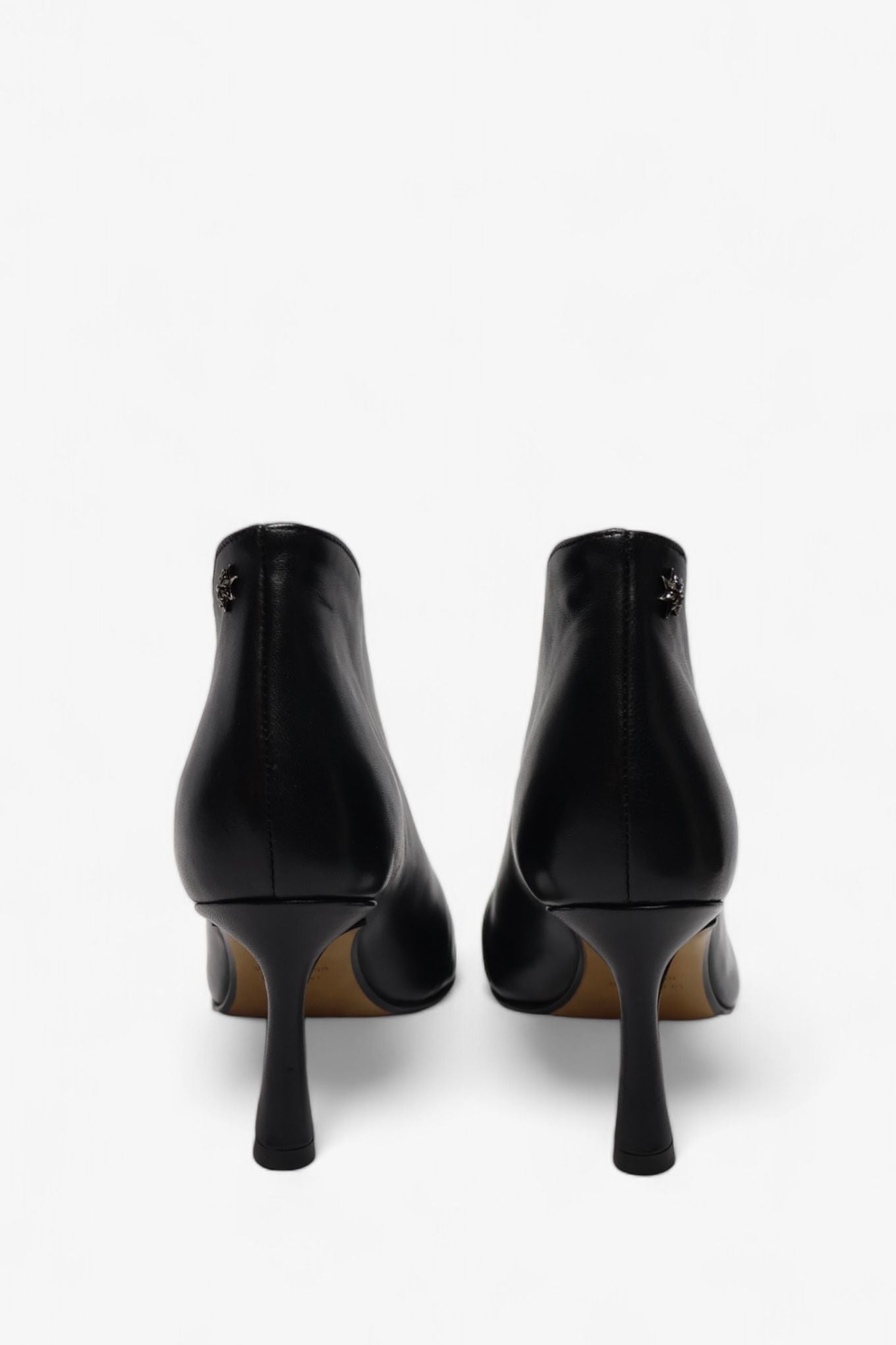 ASYMMETRIC BLACK LEATHER PUMPS