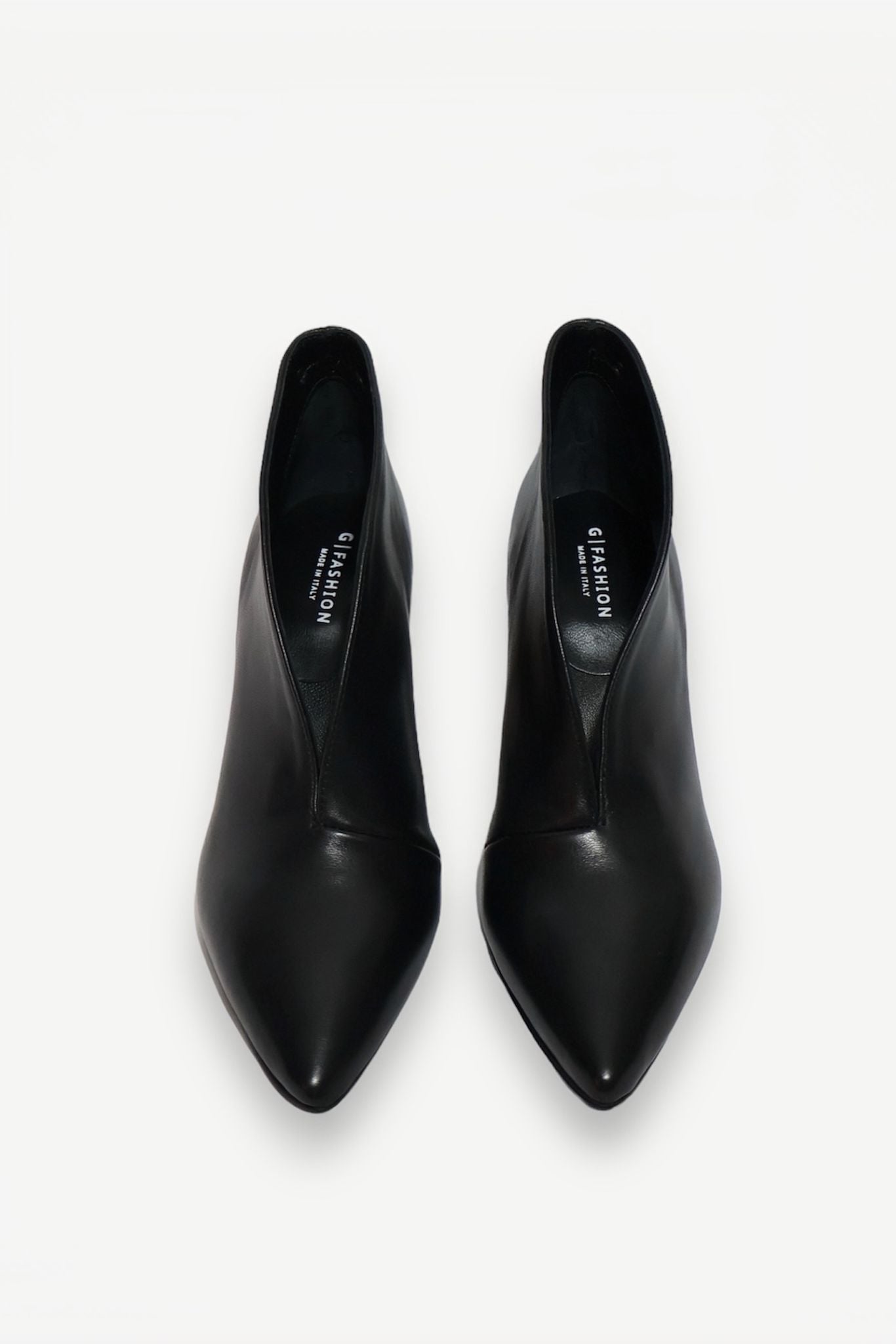 ASYMMETRIC BLACK LEATHER PUMPS