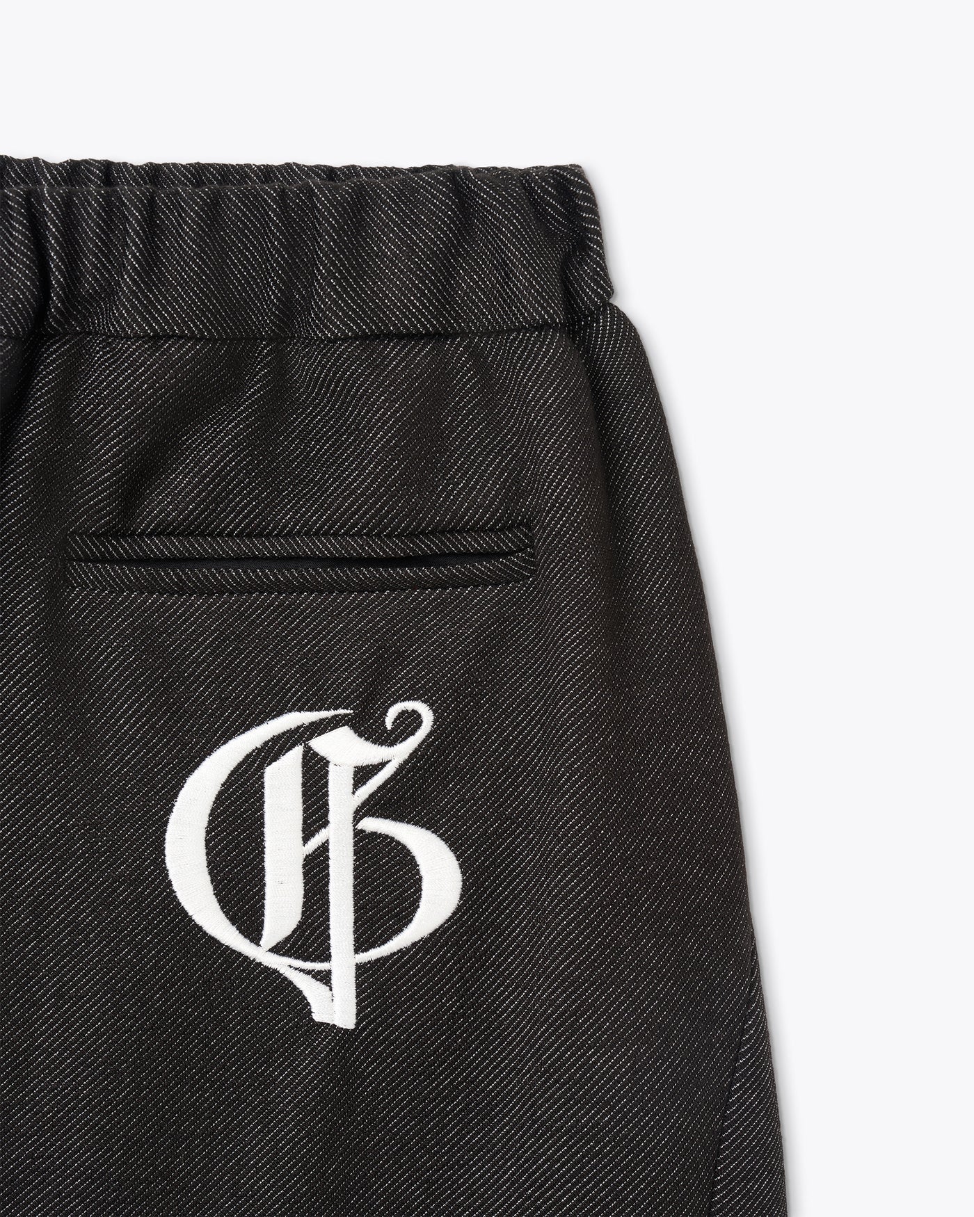 SLIM HAREM PANTS WITH LOGO